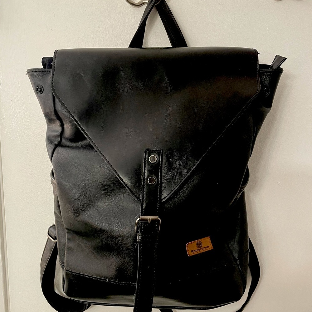 Black leather photography backpack